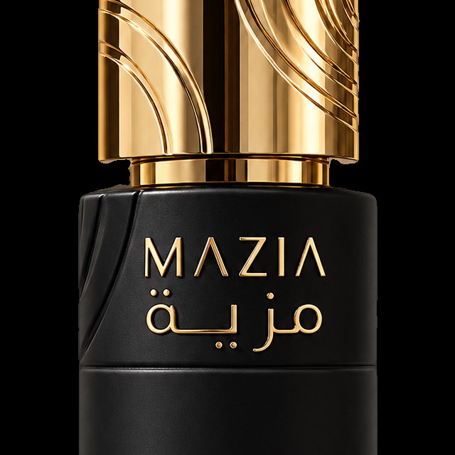 الغطاء الذهبي المحفور وشعار مزية على العبوة